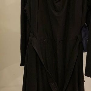 Selling a black jumpsuit with a belt